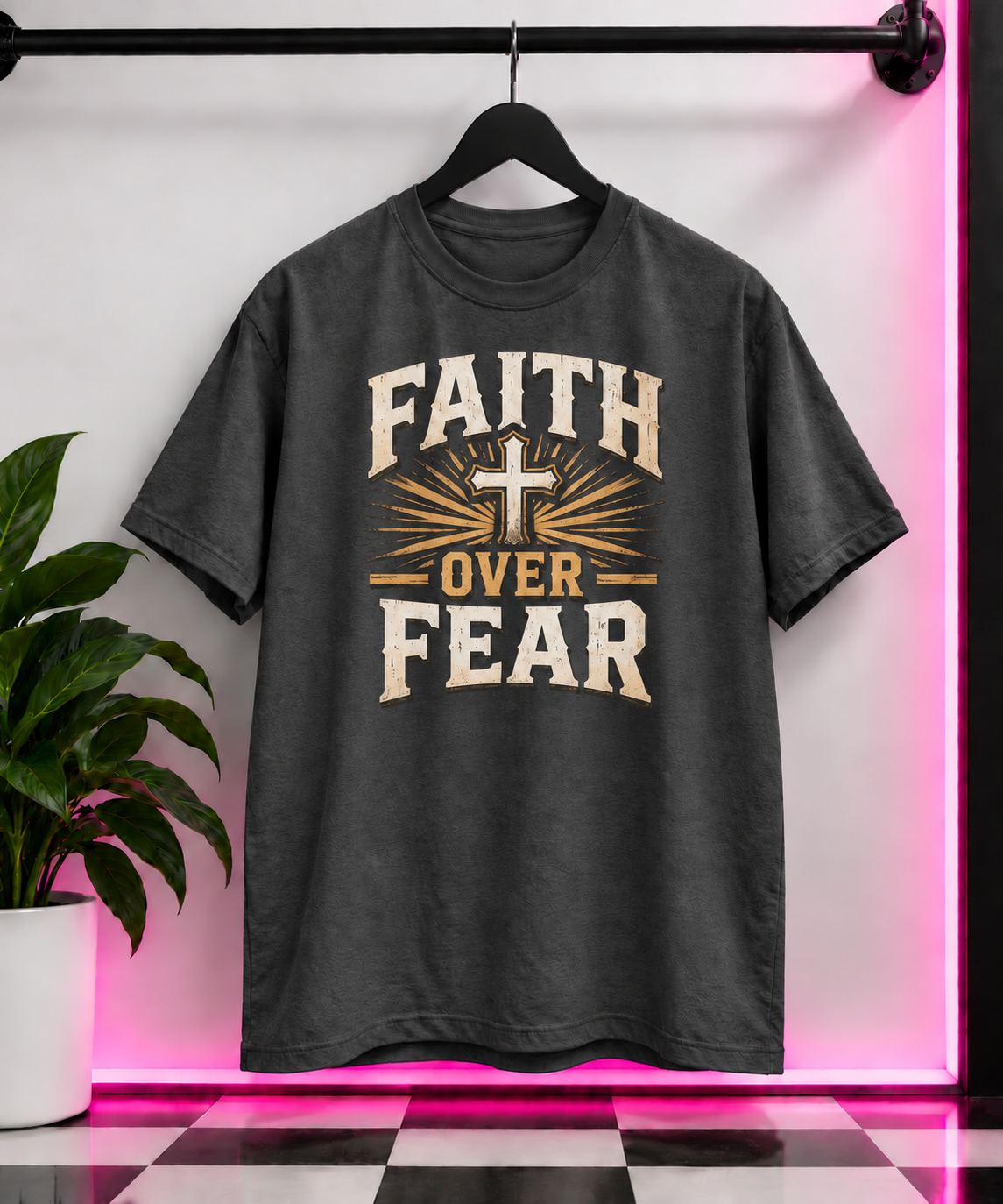 Charcoal T-shirt with Faith Over Fear lettering and a cross surrounded by gold rays.
